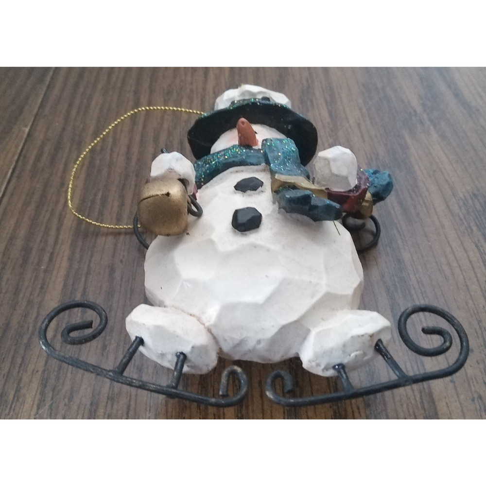 Skating Snowman Stone And Metal Christmas Ornament
